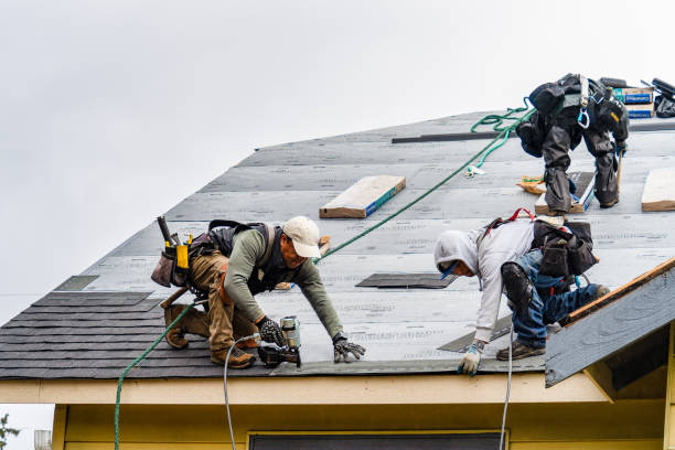 Professional Roof Replacement technician working in Gosport, IN